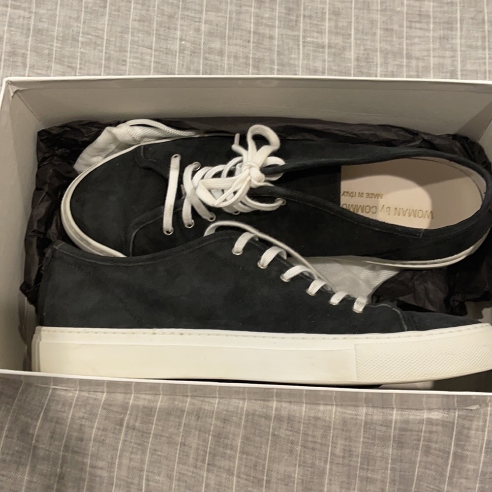 Woman by Common Projects designer sneakers